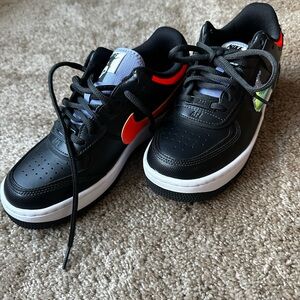 Nike Kids Black Sneakers with Red and Green Accents